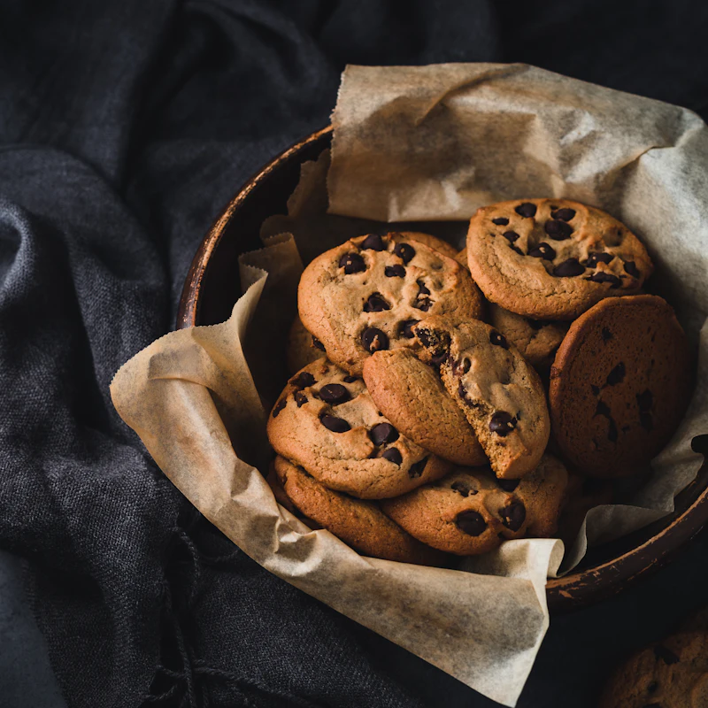 Chocolate chip cookies in a paper-lined basket