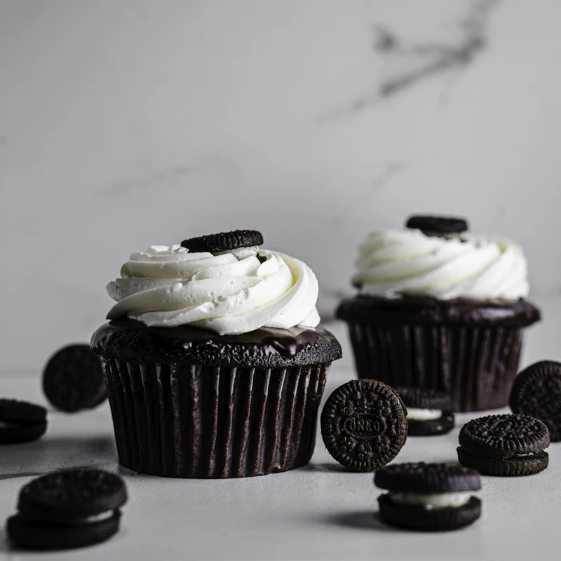 Chocolate cupcakes with cream topping